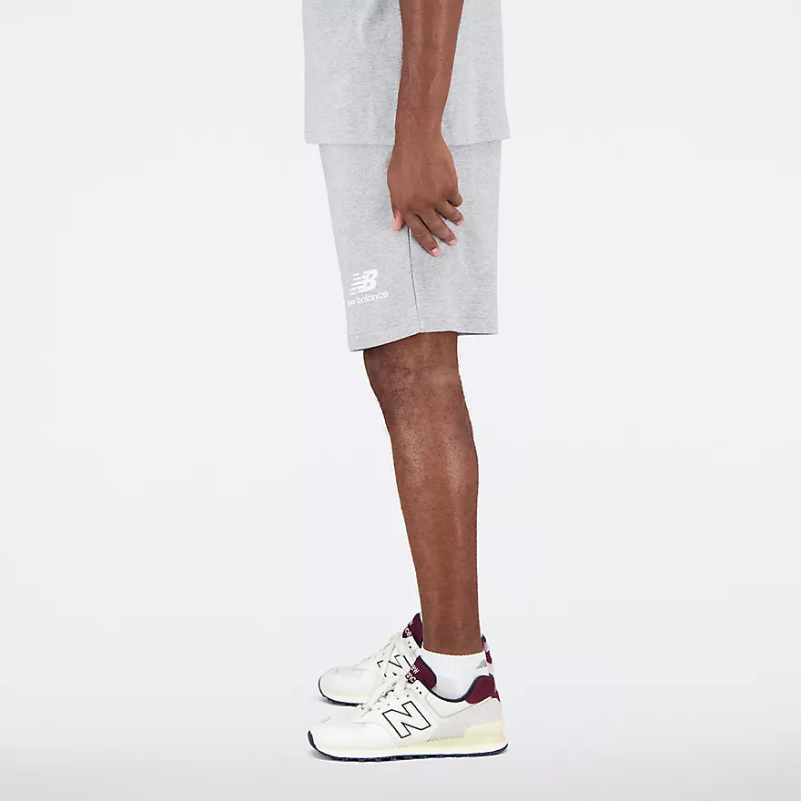 NEW BALANCE ESSENTIALS STACKED LOGO FRENCH TERRY SHORT